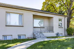 View of front of property featuring a front lawn