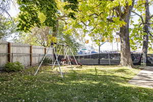 View of yard with a playground