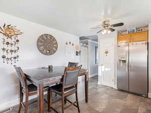 Dining room featuring ceiling fan