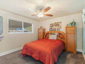 Bedroom featuring ceiling fan