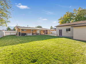 View of yard with a patio area