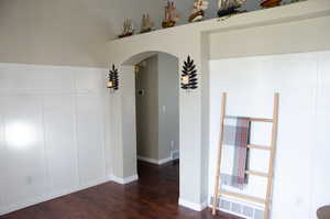 Sitting room featuring dark hardwood / wood-style flooring