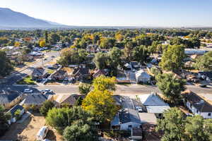 Birds eye view of property with a mountain view