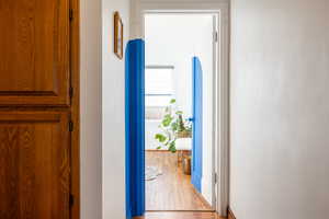 Corridor featuring light hardwood / wood-style flooring