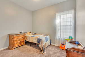 View of carpeted bedroom