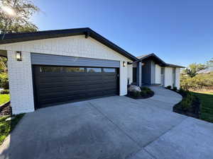 View of front of property with a garage