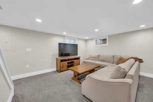 Basement boasts a large open space with high ceilings