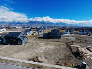 Drone / aerial view featuring a mountain view