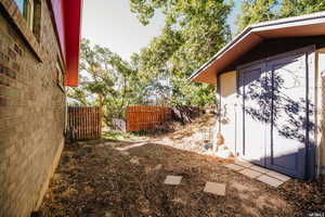 View of yard with a shed