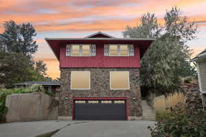 View of front of property with a garage