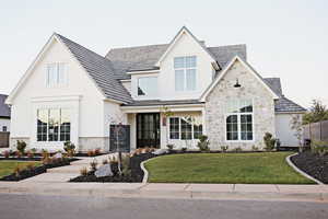 View of front of house with a front lawn