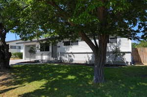 View of front of house featuring a front lawn