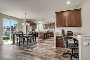 Kitchen and Dining Area with Student Workspace.