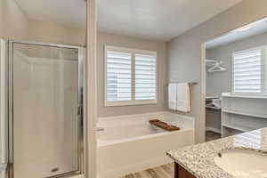 Master Bedroom with Garden Tub and Separate Shower.