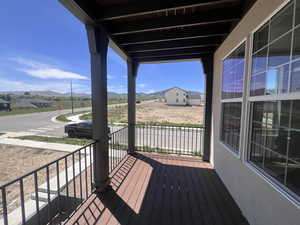 Covered balcony with mountain and valley views