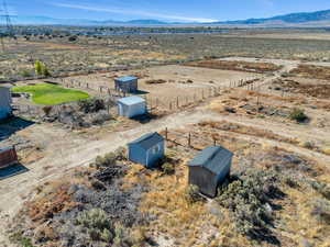 Drone / aerial view with a mountain view and a rural view