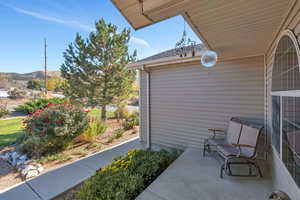 View of patio with a mountain view