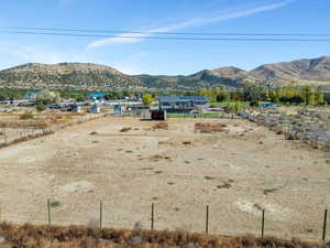 Property view of mountains featuring a rural view