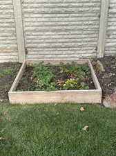 View of exterior details/garden grow boxes.