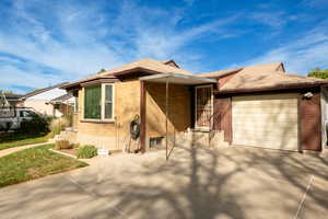 View of front of home with a garage