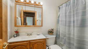 Bathroom with vanity and toilet