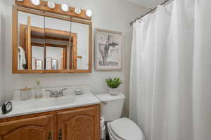 Bathroom with vanity and toilet