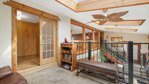 Interior balcony, ceiling fan, and natural light