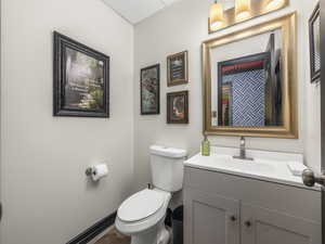 Bathroom with vanity and toilet