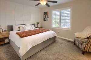 Bedroom with carpet floors and ceiling fan