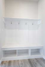 Mudroom with light wood-type flooring