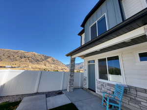 View of patio / terrace with a mountain view