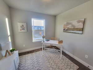 Home office with carpet flooring