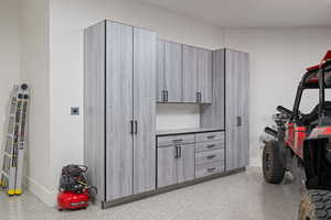 Spacious closet featuring vaulted ceiling