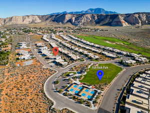 Birds eye view of property with a mountain view