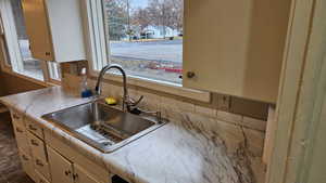 Kitchen with backsplash and sink