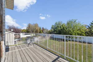 Wooden deck featuring a yard right off the master bedroom on the top floor