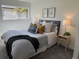 View of carpeted bedroom