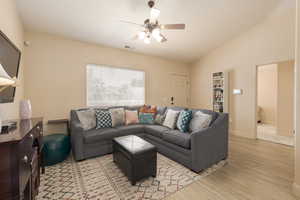 Living room with vaulted ceiling