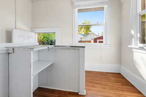 Interior space with hardwood / wood-style floors