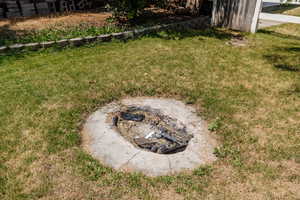 View of yard featuring a fire pit