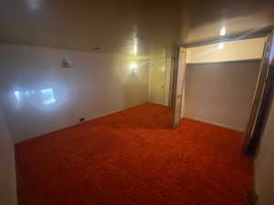 Basement featuring carpet floors