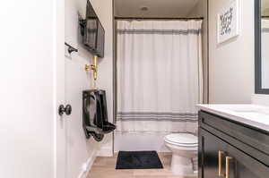 This full basement bathroom offers all the comforts of your favorite Sports Bar...because why not?