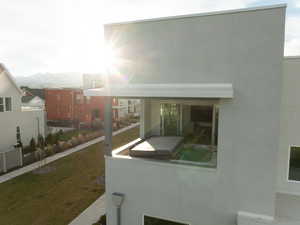 Exterior space featuring a lawn and a mountain view