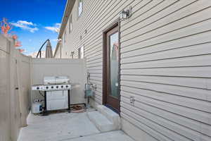 View of patio / terrace featuring a grill