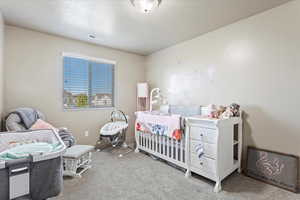 Bedroom featuring carpet flooring