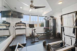 Exercise room featuring ceiling fan