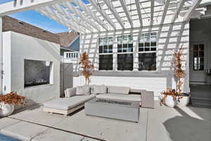 View of patio / terrace featuring a fire pit and a pergola