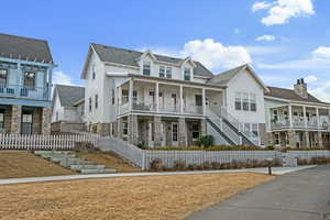 View of front of home with a balcony