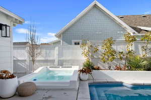 View of swimming pool with a grill