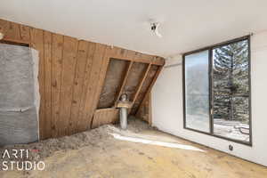 Interior space featuring wooden walls